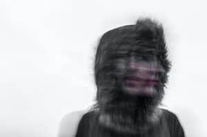 A blurred face